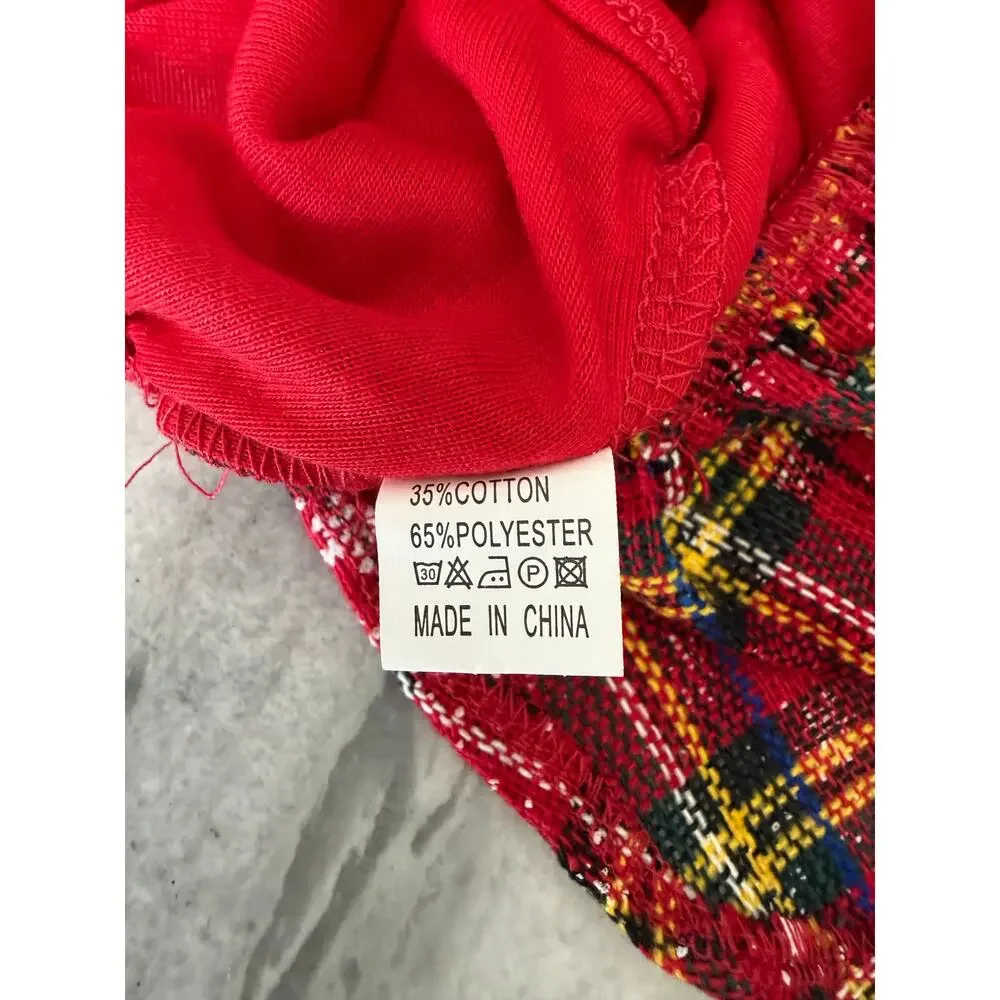 Dog Christmas Dress Fits Like a Small tag says Medium
